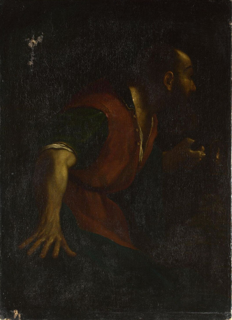 A Bearded Man Holding a Lamp