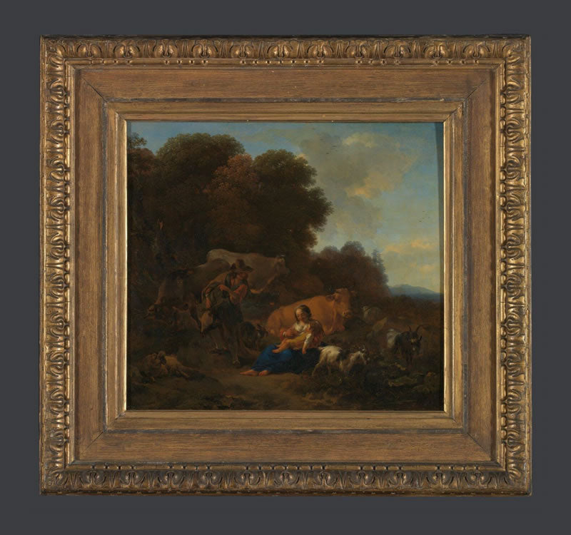 A Peasant playing a Hurdy-Gurdy to a Woman and Child in a Woody Landscape, with Oxen, Sheep and Goats