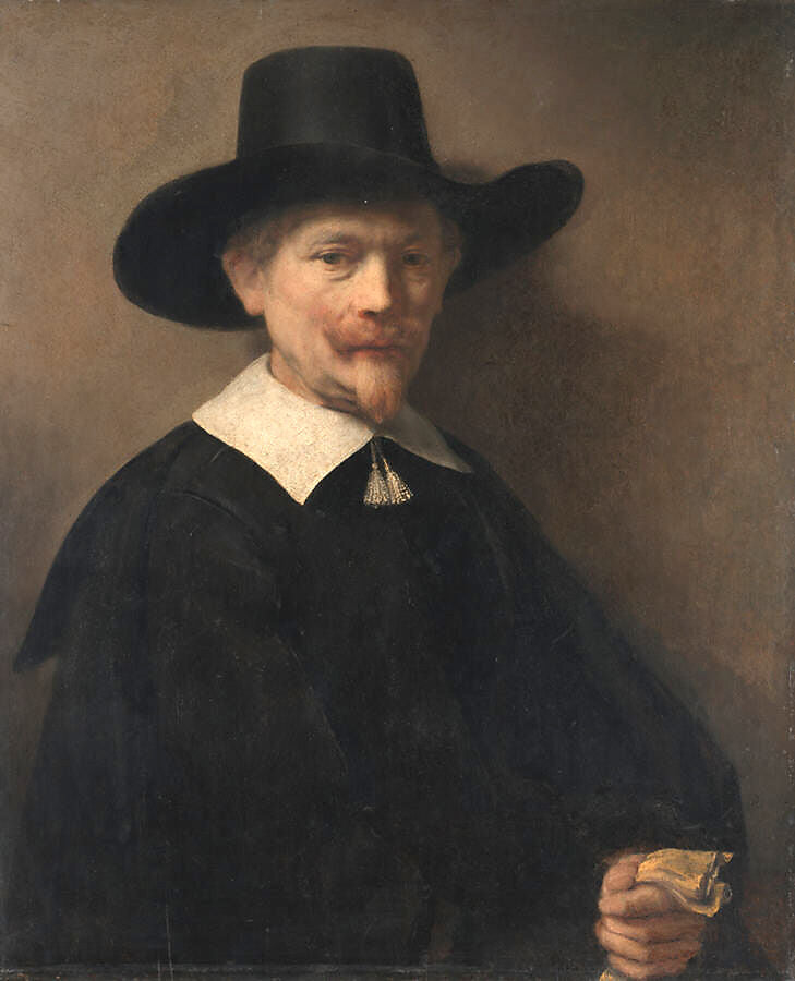 Portrait of a Man Holding Gloves