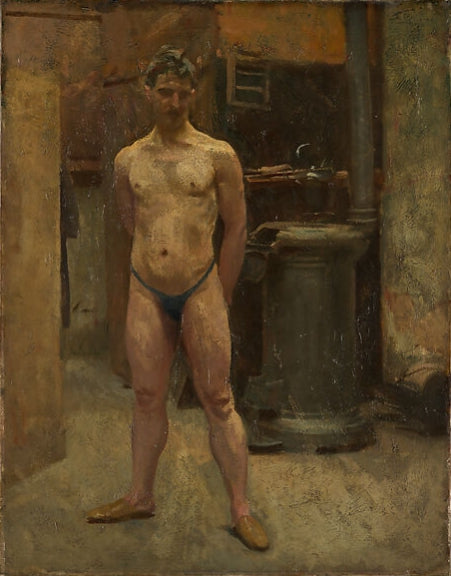 A Male Model Standing before a Stove