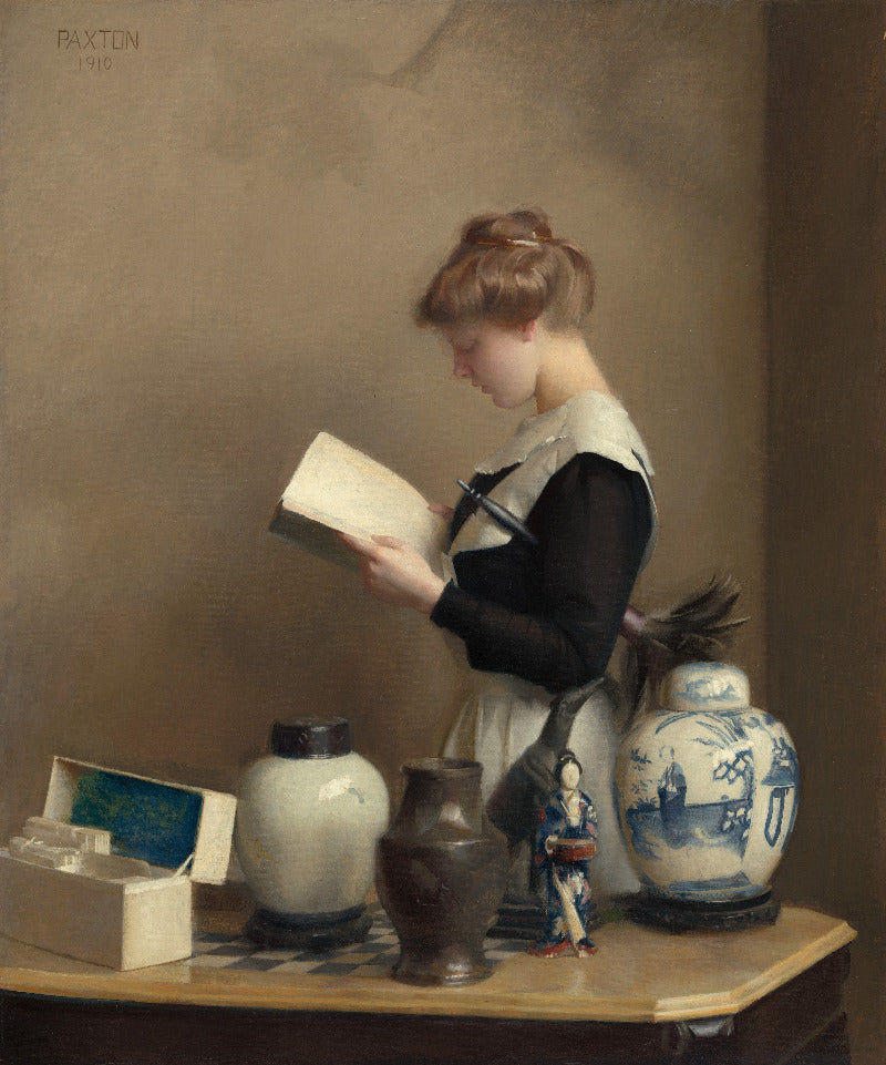 A classical oil painting by Paxton depicting a young girl in a black and white dress reading a book, standing beside a table with ceramic vases and a small figurine, set against a warm brown background.