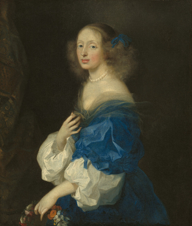 Portrait of a woman in a blue and white dress with a dark background