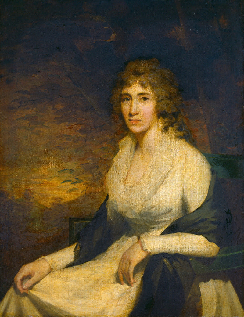 Portrait of a woman in a white dress with a dark background